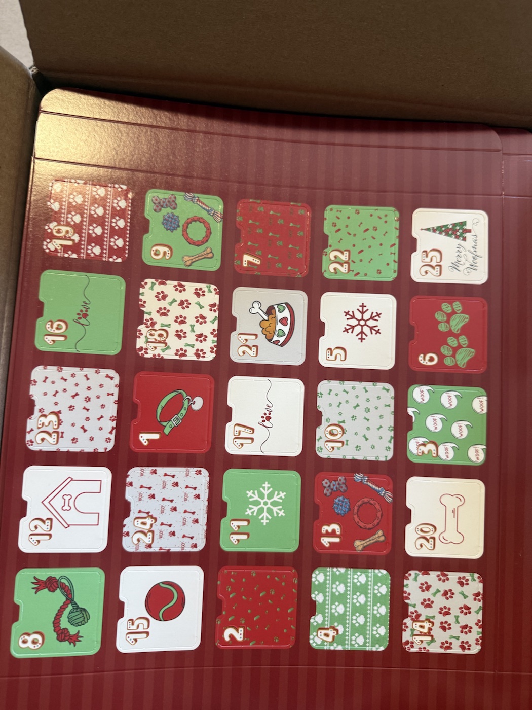 Red sample Advent calendar with numbered doors and holiday patterns