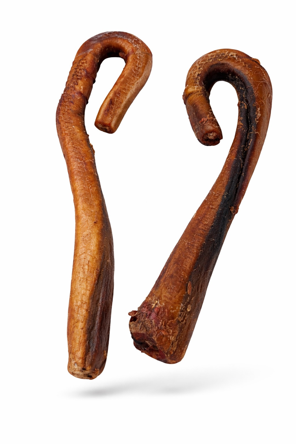 Two candy cane-shaped bully sticks shown as examples; sold individually